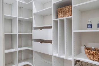 Custom-Pantry-Storage-with-Vertical-Shelves-and-Pull-out-Wire-Rack-Drawers