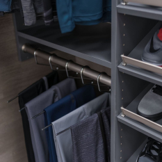 Custom Grey Reach-in Closet with shoe fences, double hang for short hang clothes and medium hang for dress shirts. Lots of upper adjustable shelves.