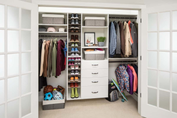 Reach In Closet System Floating Off the Ground. One with a drawer bank and one without drawer bank.