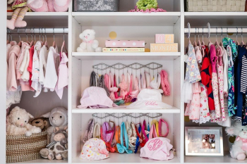 Toddler, Nursery or Baby Reach-in custom closet. Easy to change system in the long run from adjustable shelves to hanging or raise the hanging sections.