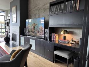 Custom Entertainment media center for tv console, media storage, filing cabinets and more storage. Sitting desk area.