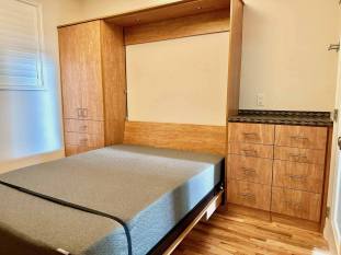 queen size murphy bed with built-in desk wood grain finish