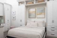 White murphy bed (wall bed) with side cabinets