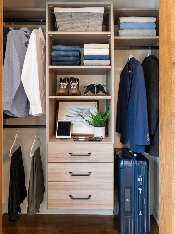 Wood Grain Reach-in Closet Organizer with Black rods and handles for drawers. Simple closet organizer for entry closet or bedroom reach-in.