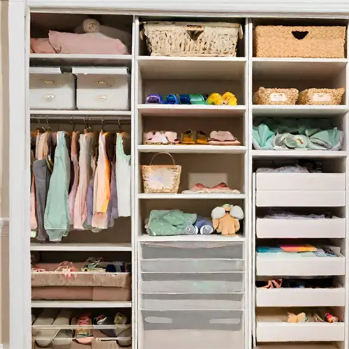 Custom closet by Portland Closet with built-in shelving and hanging rods