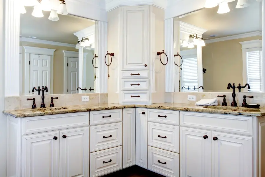 Custom white master bathroom cabinets with double sinks