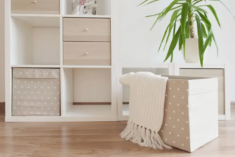 Custom white shelving units with storage cubes