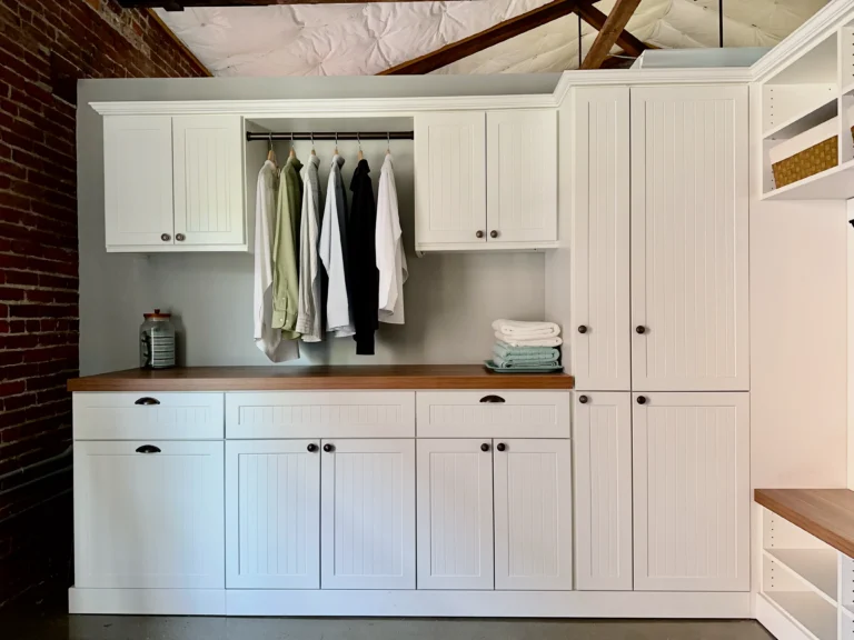 Custom laundry room cabinets and storage built by Portland Closet Company