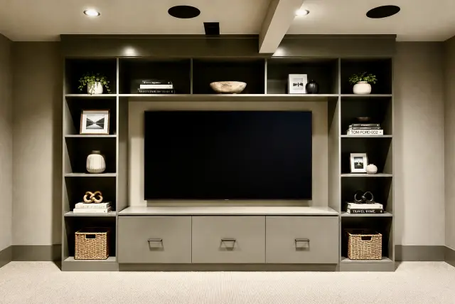 Floor to ceiling media area with built-in storage