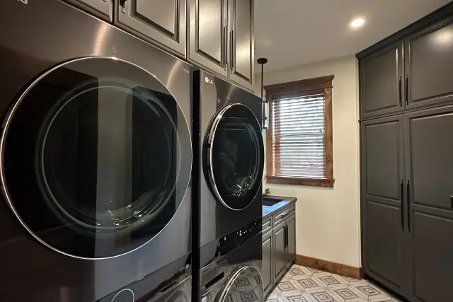 Luxury laundry room by Portland Closet Company